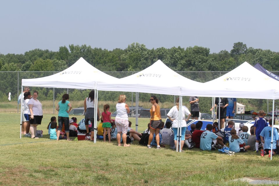 Tents used at a children’s soccer game help protect against the sun's damaging UV rays and prevent skin cancer.